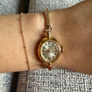Vintage Timex Gold Toned Women's Watch with Stretchy Band
